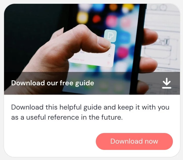 Hand holding smartphone with download guide message.