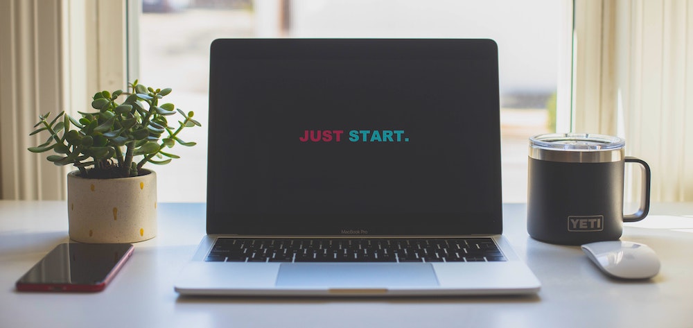 Laptop computer with Just Start displayed on the screen