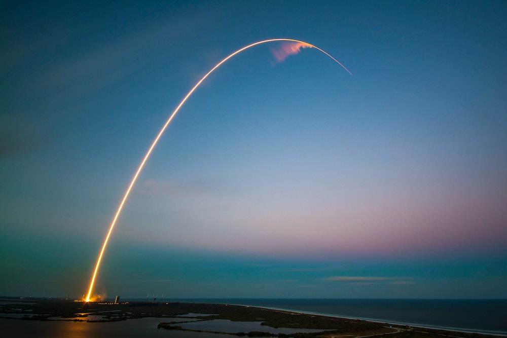 Rocket launching at sunrise